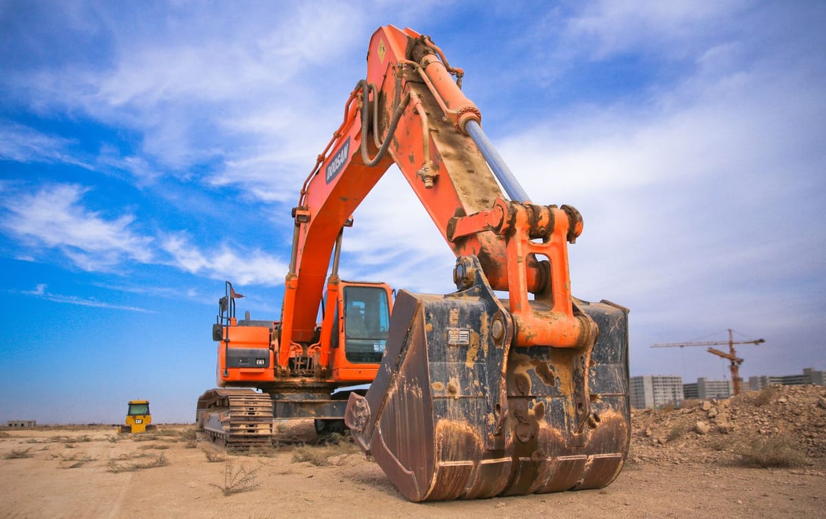 A septic system installation in progress, the scope of work that drives system cost